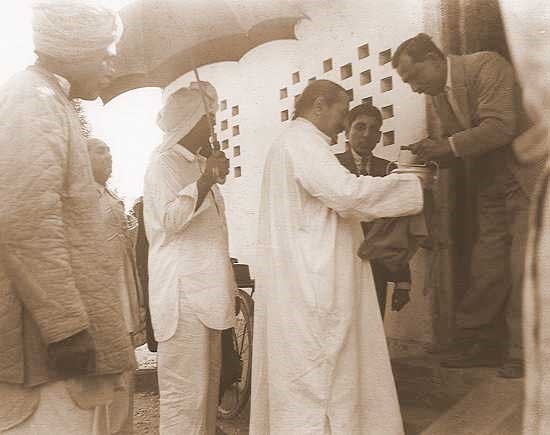 Meher Baba Begging for food during New Life